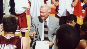 New Mexico State head coach Lou Henson serving as a special advisor to the Aggie men's basketball program.