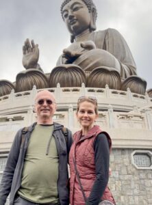 Lori Keleher ’97, Ph.D, Hong Kong 2024 Tian Tan Buddha with co-author Jay Drydyk